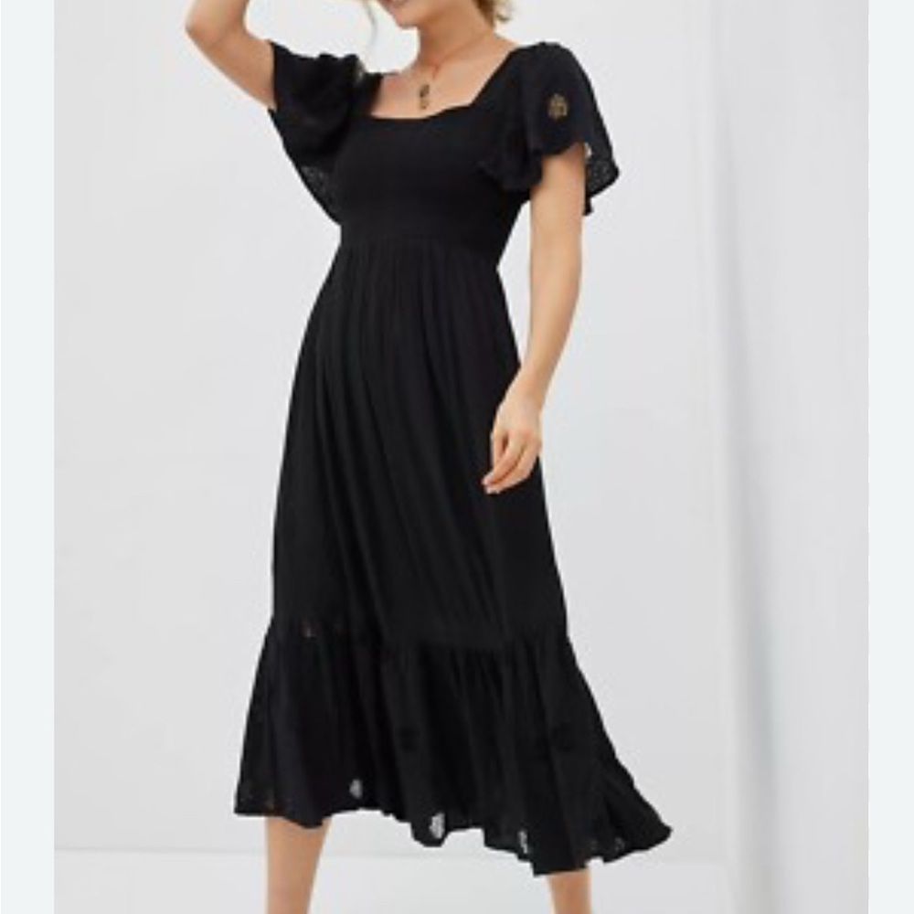 Elegant Black Midi Dress for Women seen worn and kept by Anthropologie